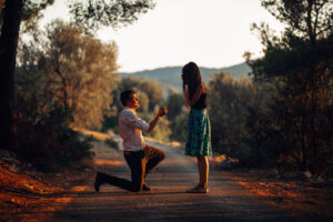 man proposing on rural road