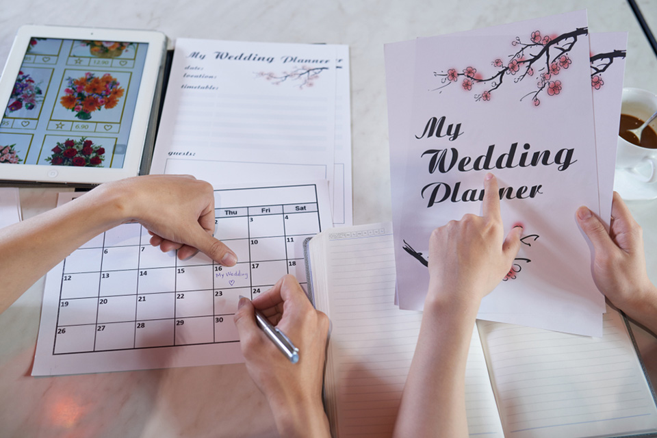 two people planning a wedding together